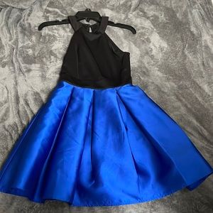 Blue and black dress, has been worn once, and no stains size 0.